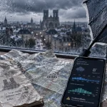 meteo champagne reims : parapluie près d’une carte météo, pluie indiquée 90%